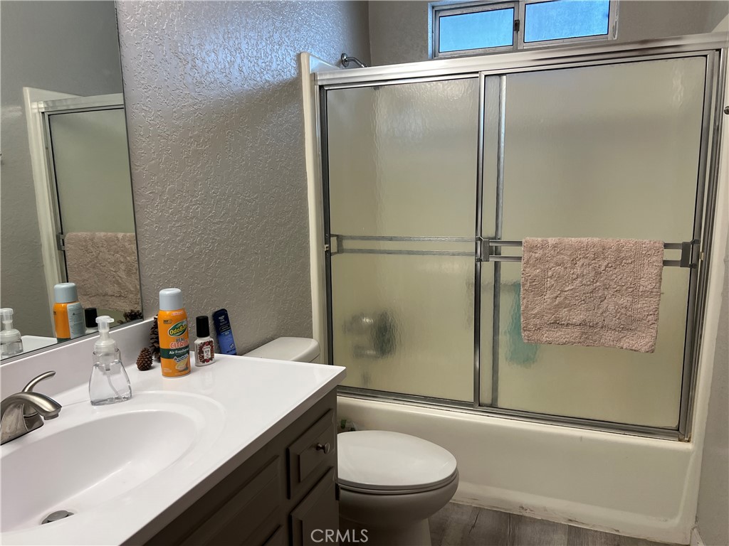 23857 Zuger Drive Crestline, CA 92325 - Photo 21 of 29 a bathroom with a sink toilet and shower