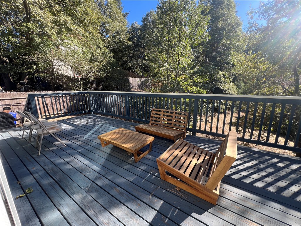 23857 Zuger Drive Crestline, CA 92325 - Photo 24 of 29 a view of balcony with wooden floor