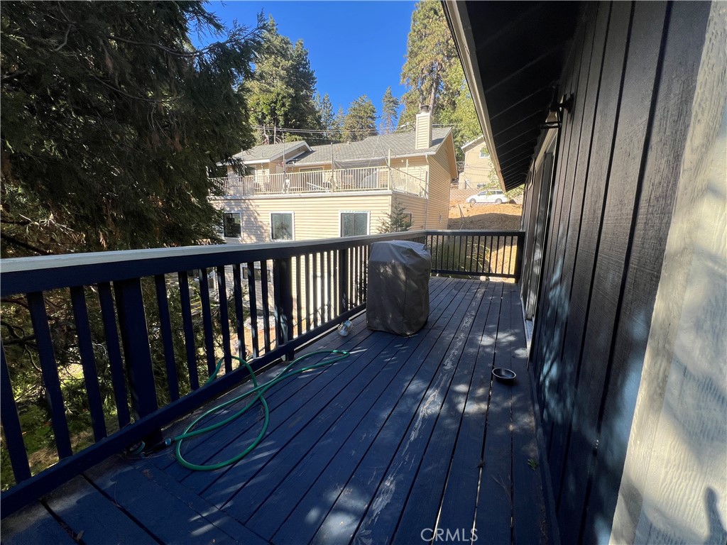 23857 Zuger Drive Crestline, CA 92325 - Photo 27 of 29 a view of a balcony with furniture