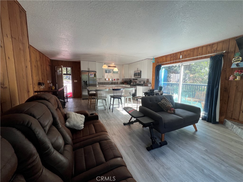 23857 Zuger Drive Crestline, CA 92325 - Photo 10 of 29 a living room with furniture and a large window