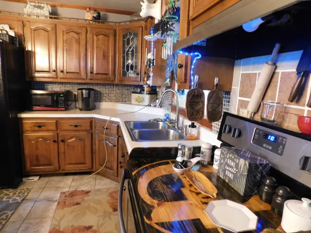 a bathroom with a shower a toilet and a sink