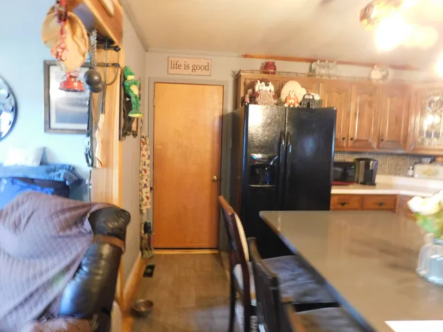 a room with furniture and wooden floor