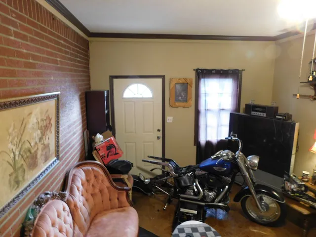 a bathroom with a shower and a glass door