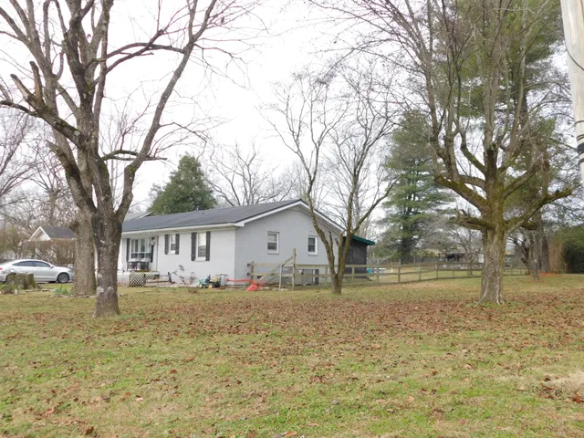 a view of house with outdoor space