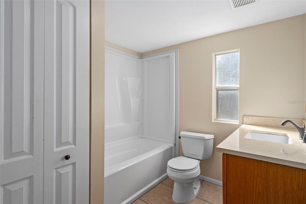 4939 West Foxhill Lane Homosassa, FL 34446 - Photo 13 of 37 a bathroom with a sink a toilet and shower