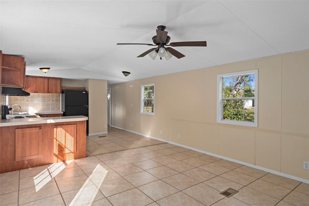 4939 West Foxhill Lane Homosassa, FL 34446 - Photo 5 of 37 a view of kitchen with stainless steel appliances cabinets and window