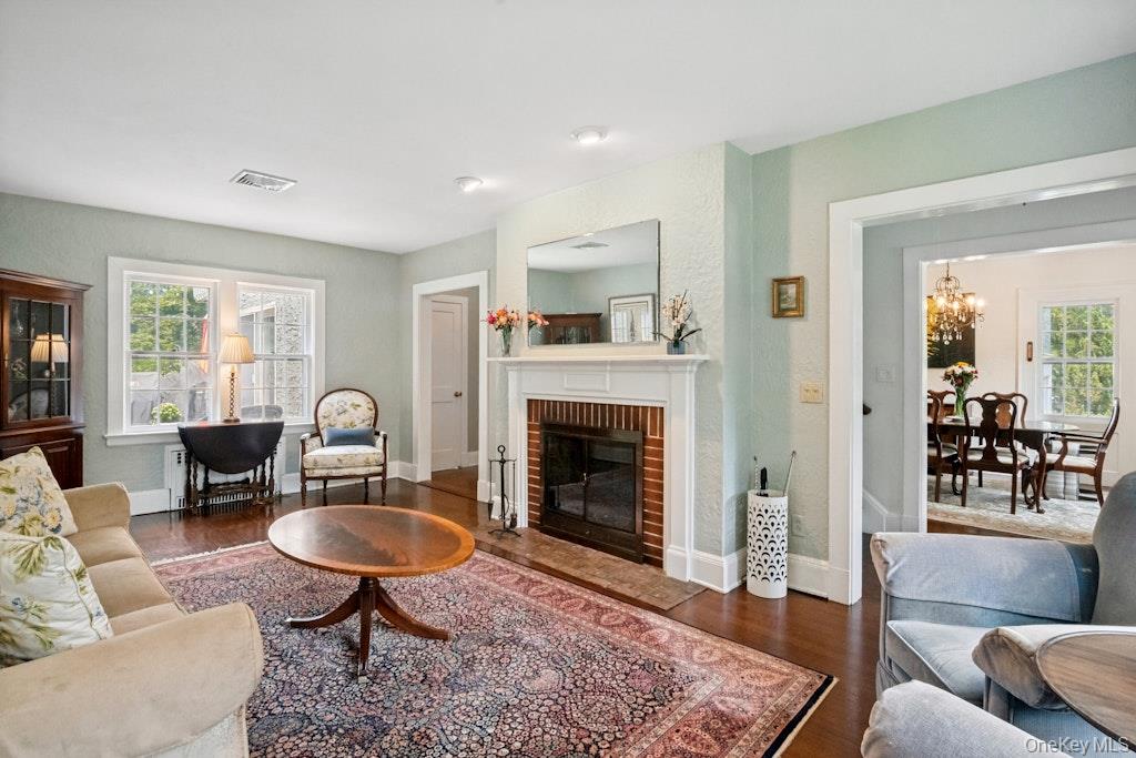 312 Quaker Road Chappaqua, NY 10514 - Photo 6 of 36 a living room with furniture and a fireplace