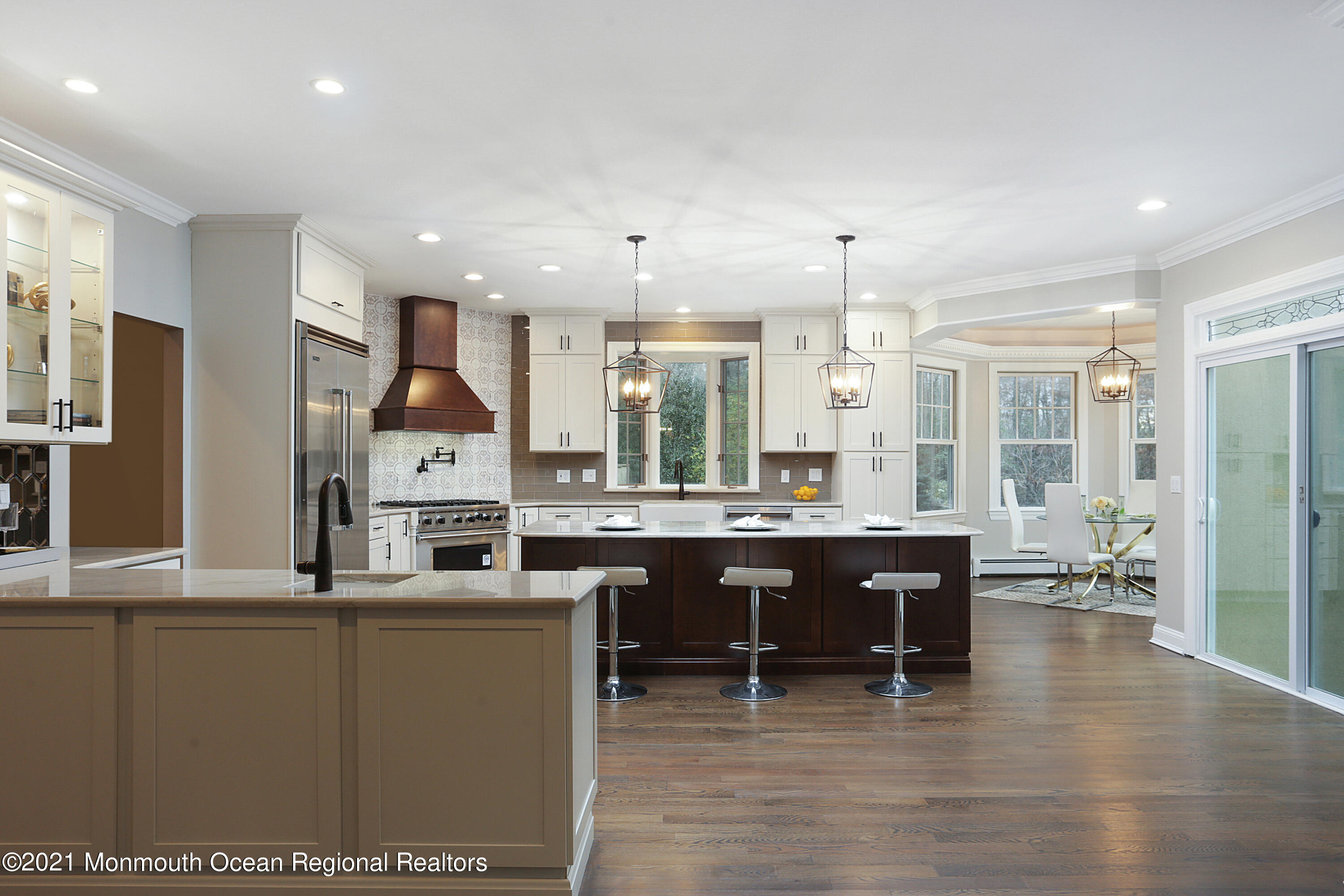 2104 Shadowbrook Drive Wall, NJ 07719 - Photo 18 of 84 a large kitchen with a table and chairs