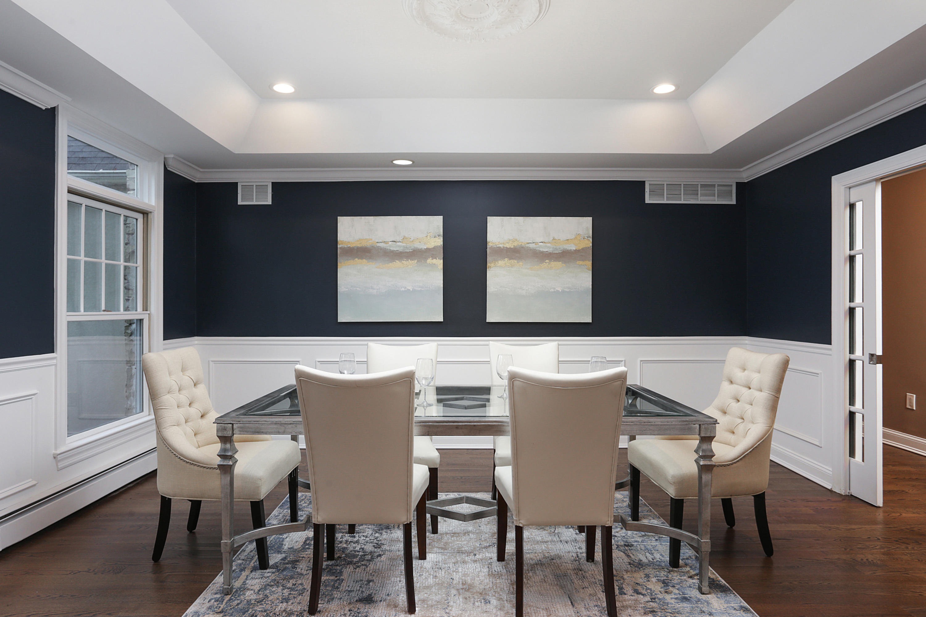 2104 Shadowbrook Drive Wall, NJ 07719 - Photo 26 of 84 a view of a dining room with furniture and wooden floor