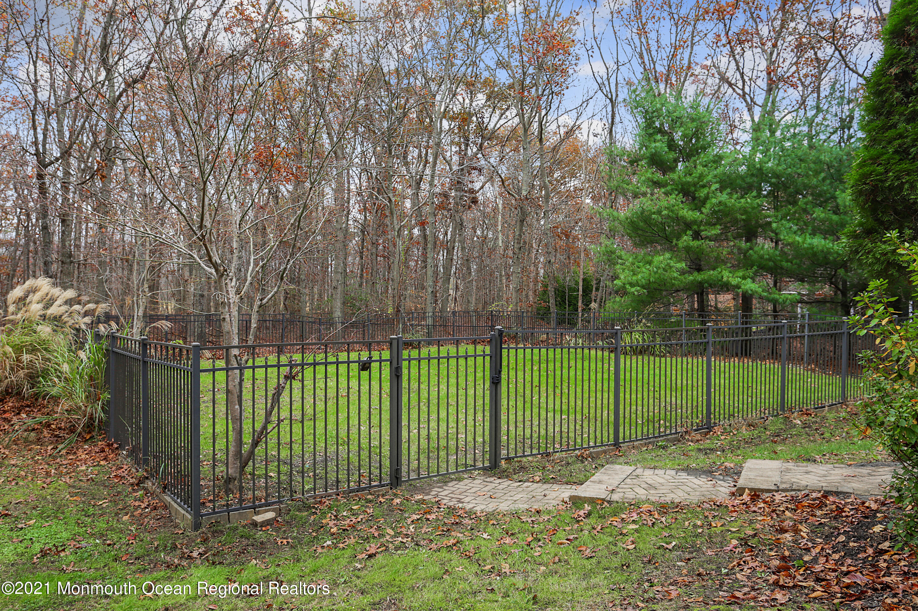 2104 Shadowbrook Drive Wall, NJ 07719 - Photo 48 of 84 a view of a backyard with a garden