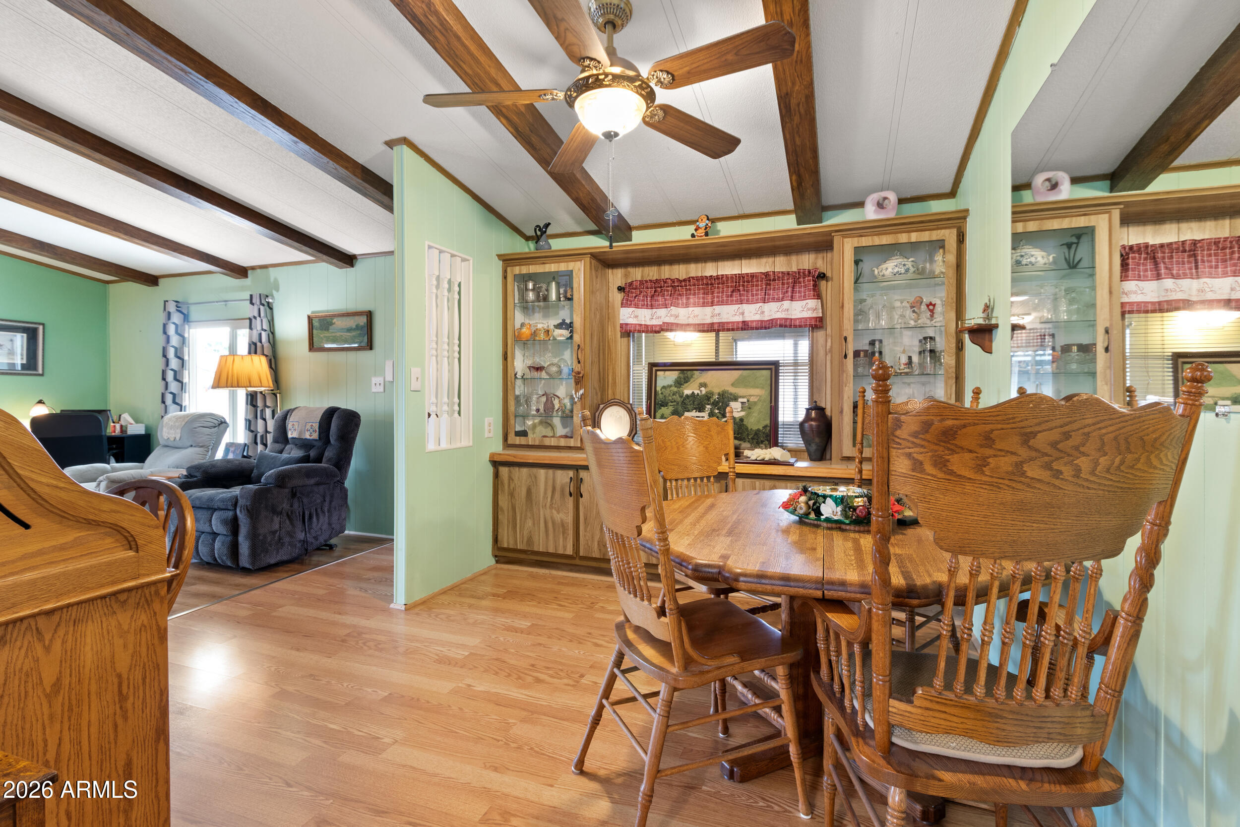 9302 East Broadway Road, Unit 178 Mesa, AZ 85208 - Photo 11 of 56 a view of a dining room with furniture window and outside view