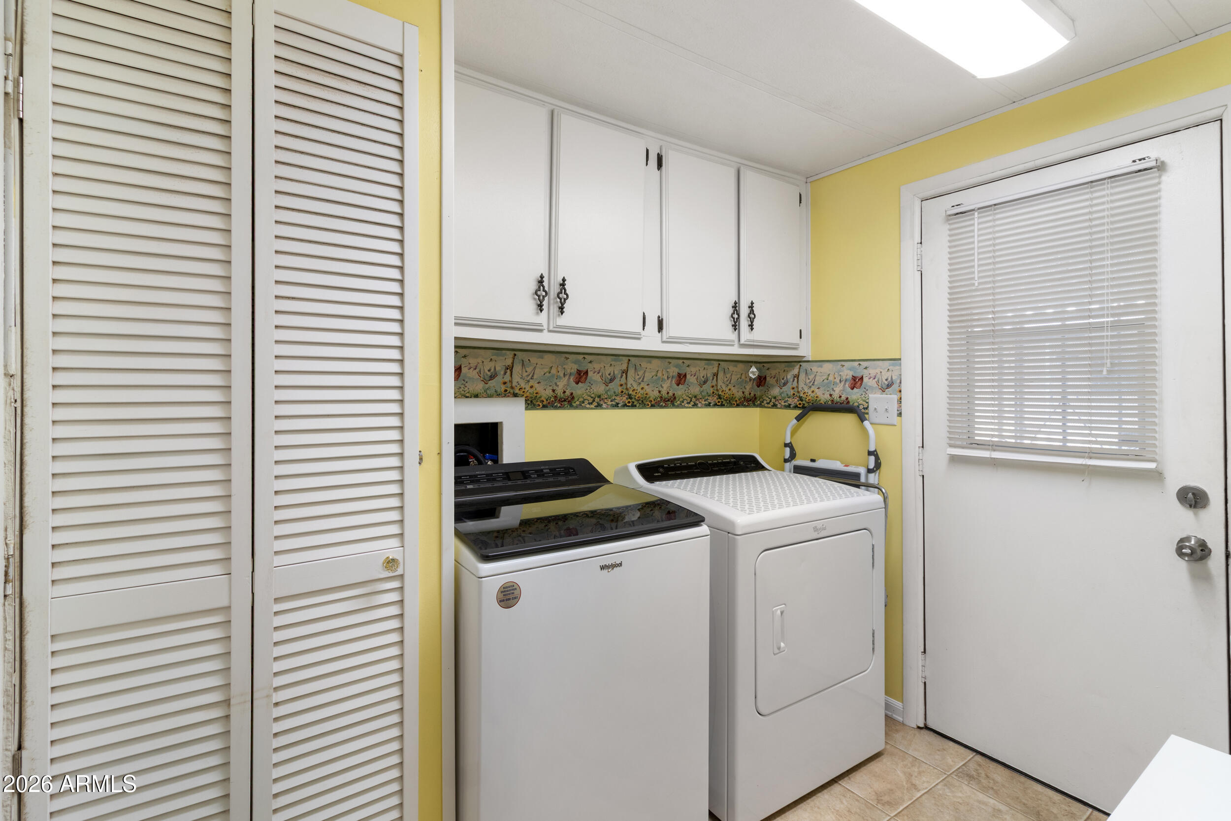 9302 East Broadway Road, Unit 178 Mesa, AZ 85208 - Photo 17 of 56 a utility room with dryer and washer