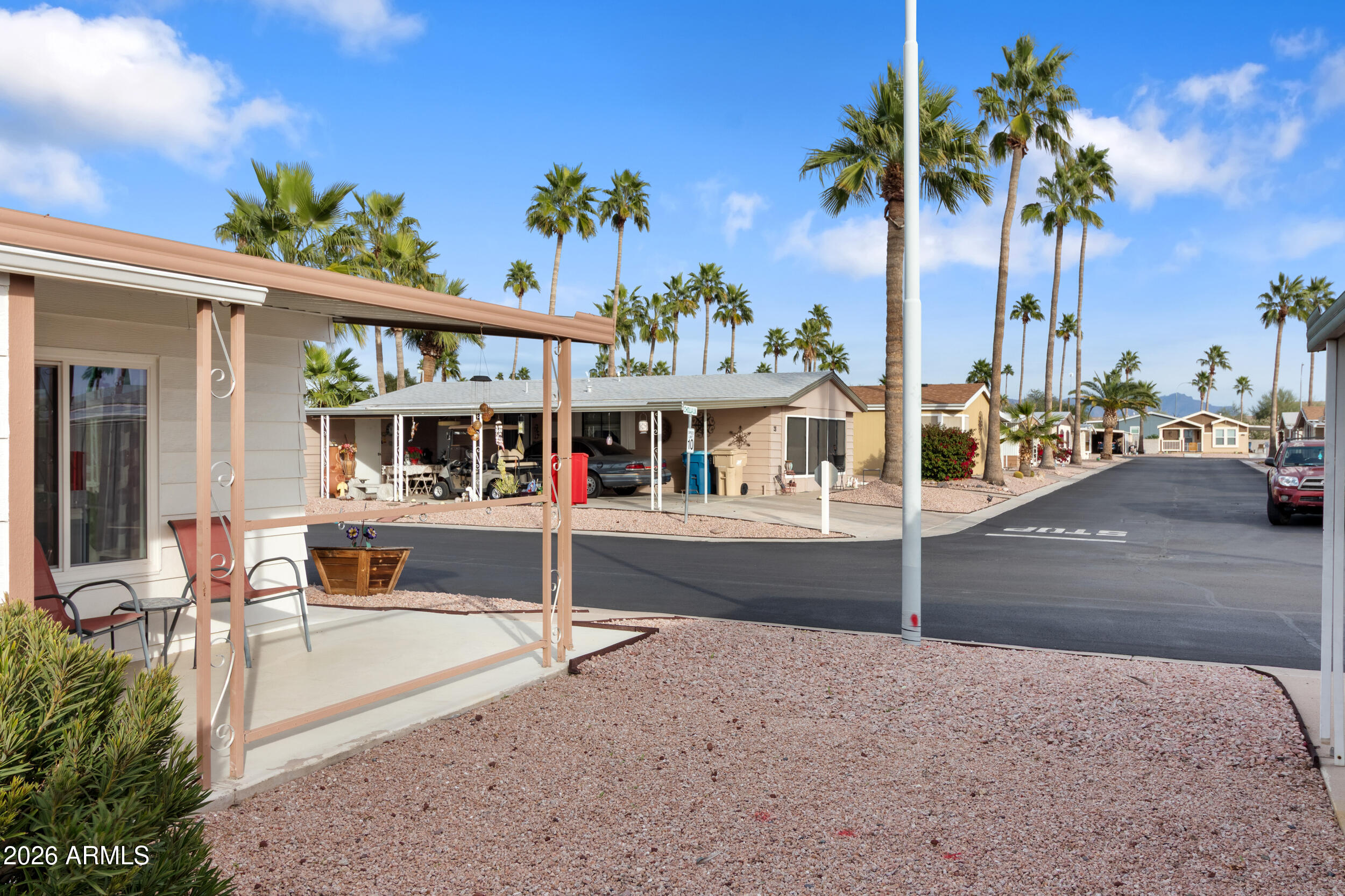 9302 East Broadway Road, Unit 178 Mesa, AZ 85208 - Photo 30 of 56 a view of a house with a patio