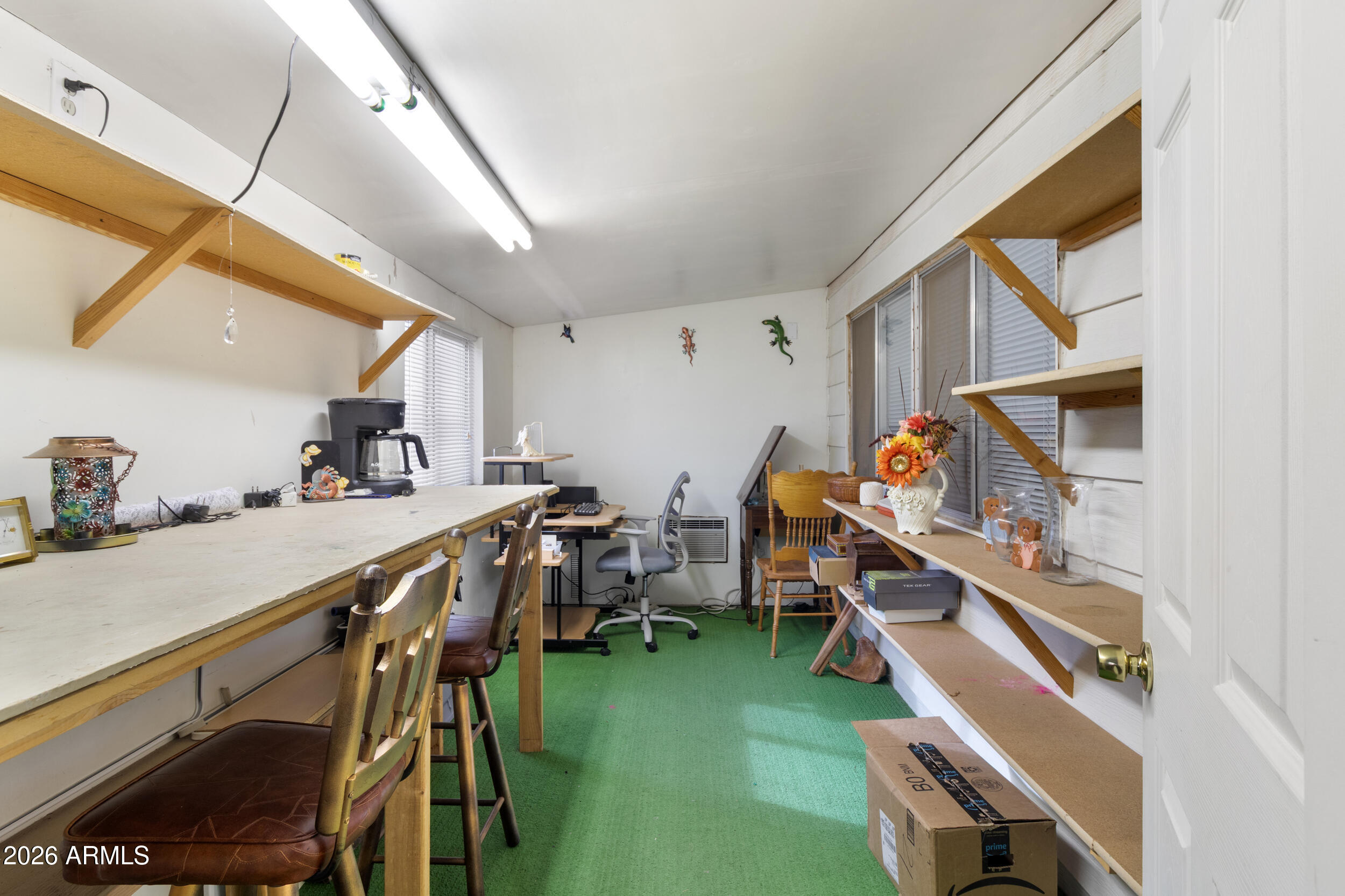 9302 East Broadway Road, Unit 178 Mesa, AZ 85208 - Photo 34 of 56 a view of a kitchen and dining room