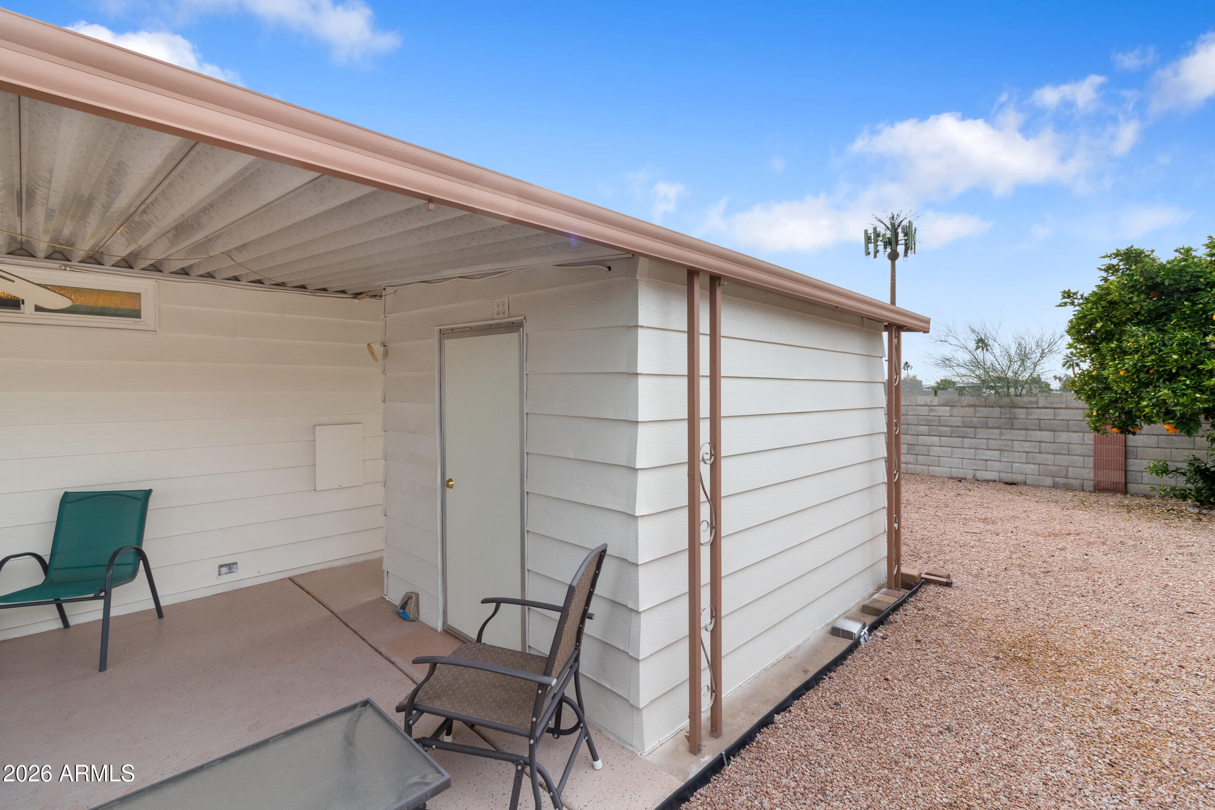 9302 East Broadway Road, Unit 178 Mesa, AZ 85208 - Photo 36 of 56 a view of a backyard