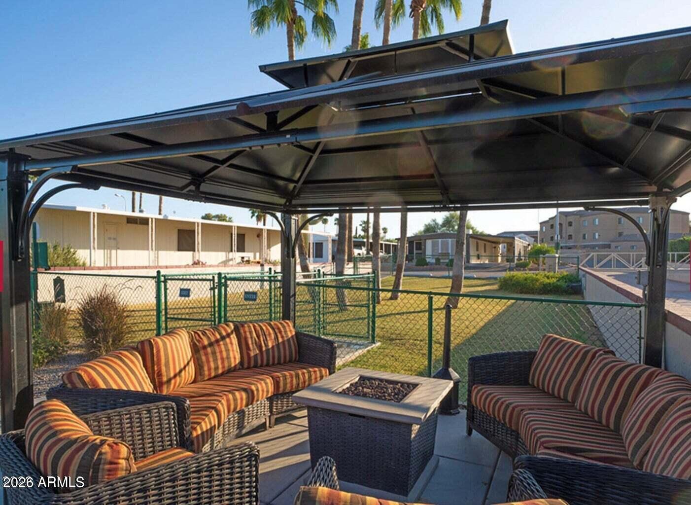9302 East Broadway Road, Unit 178 Mesa, AZ 85208 - Photo 49 of 56 a view of a couches in the roof deck