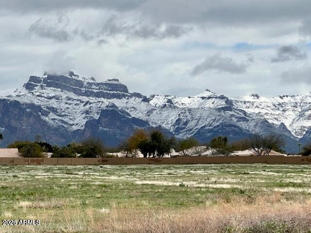 9302 East Broadway Road, Unit 178 Mesa, AZ 85208 - Photo 54 of 56 a view of a large body of water with a building in the background