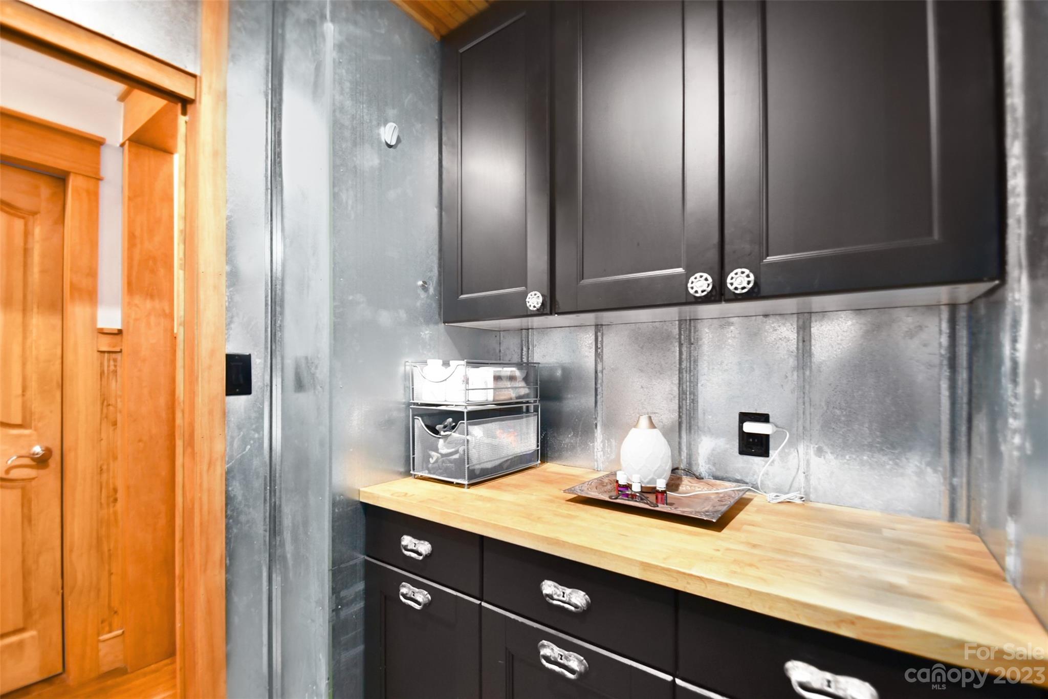 19201 Davidson-Concord Road Davidson, NC 28036 - Photo 21 of 47 a bathroom with a sink and a mirror