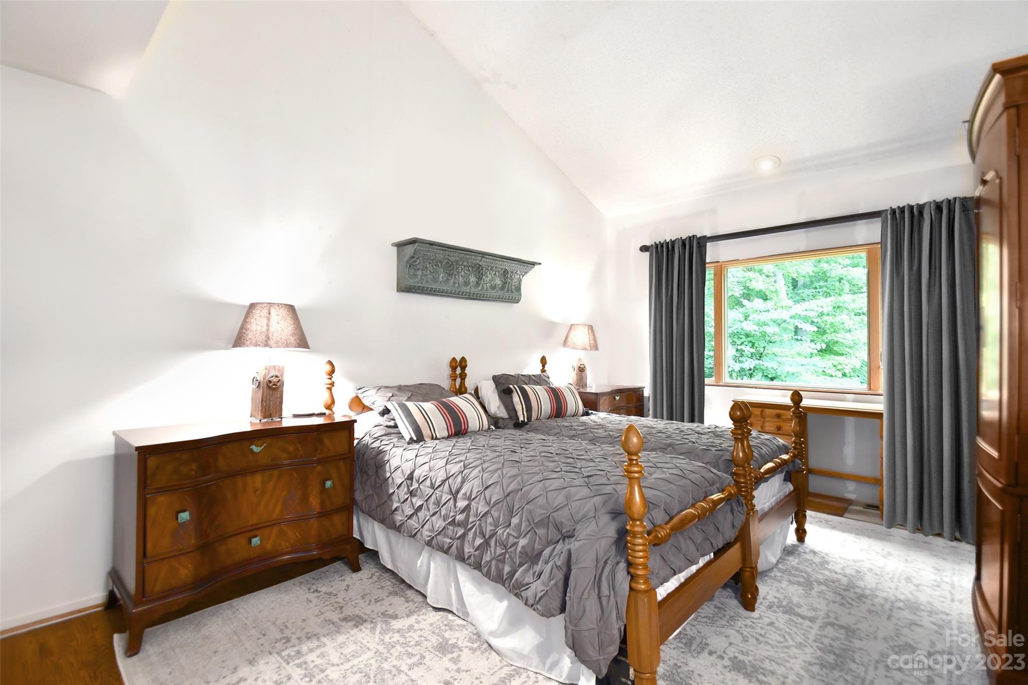 19201 Davidson-Concord Road Davidson, NC 28036 - Photo 24 of 47 a bedroom with a bed and large windows