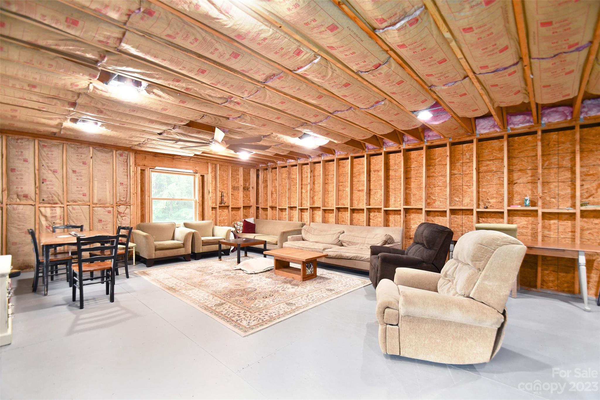 19201 Davidson-Concord Road Davidson, NC 28036 - Photo 30 of 47 a living room with furniture and a large window