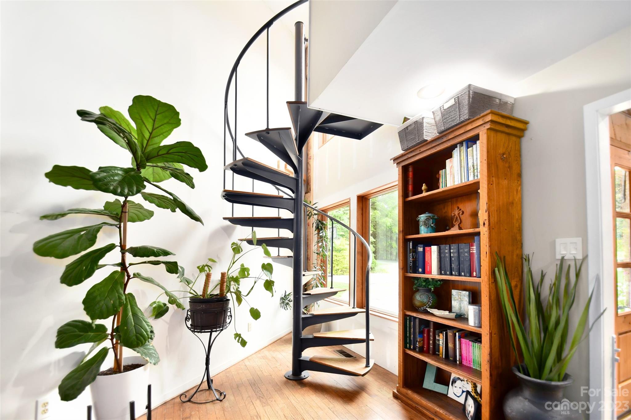 19201 Davidson-Concord Road Davidson, NC 28036 - Photo 8 of 47 a view of a book shelf with a book shelf