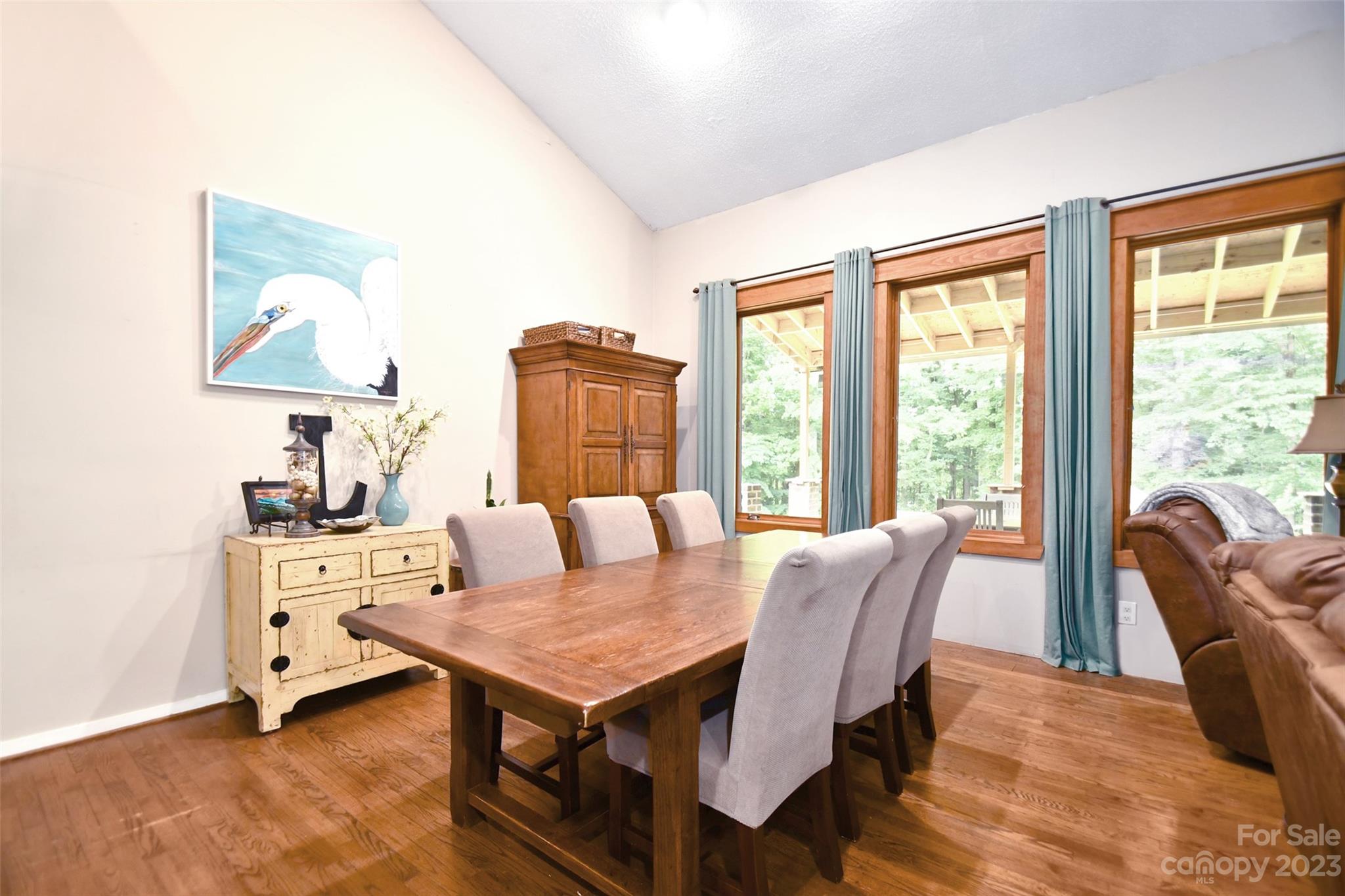 19201 Davidson-Concord Road Davidson, NC 28036 - Photo 9 of 47 a view of a dining room with furniture window and outside view