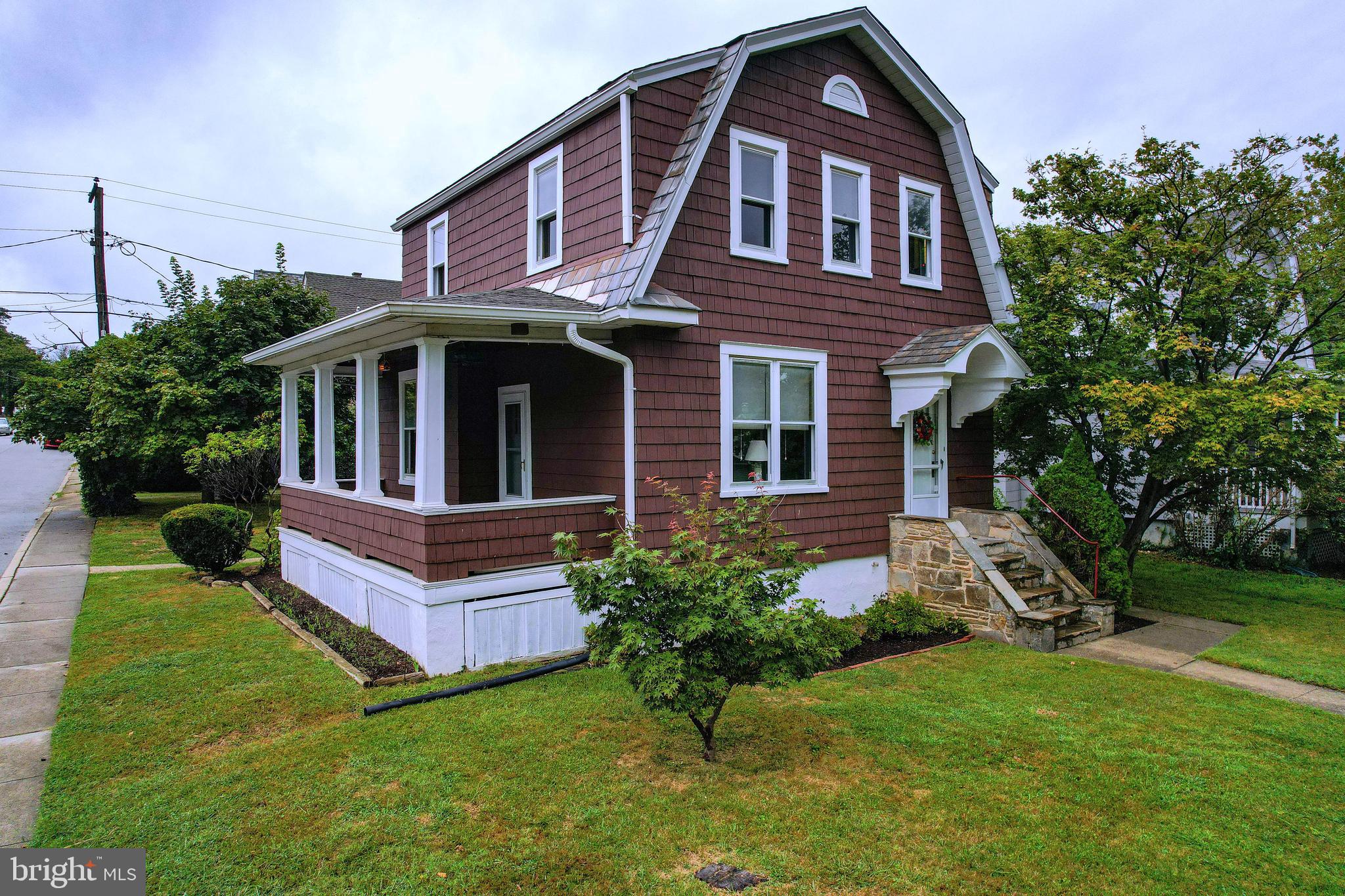 5302 Wendley Road Baltimore, MD 21229 - Photo 36 of 38 a front view of a house with a yard