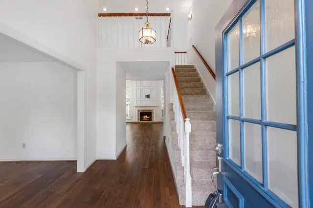 a view of entryway with wooden floor