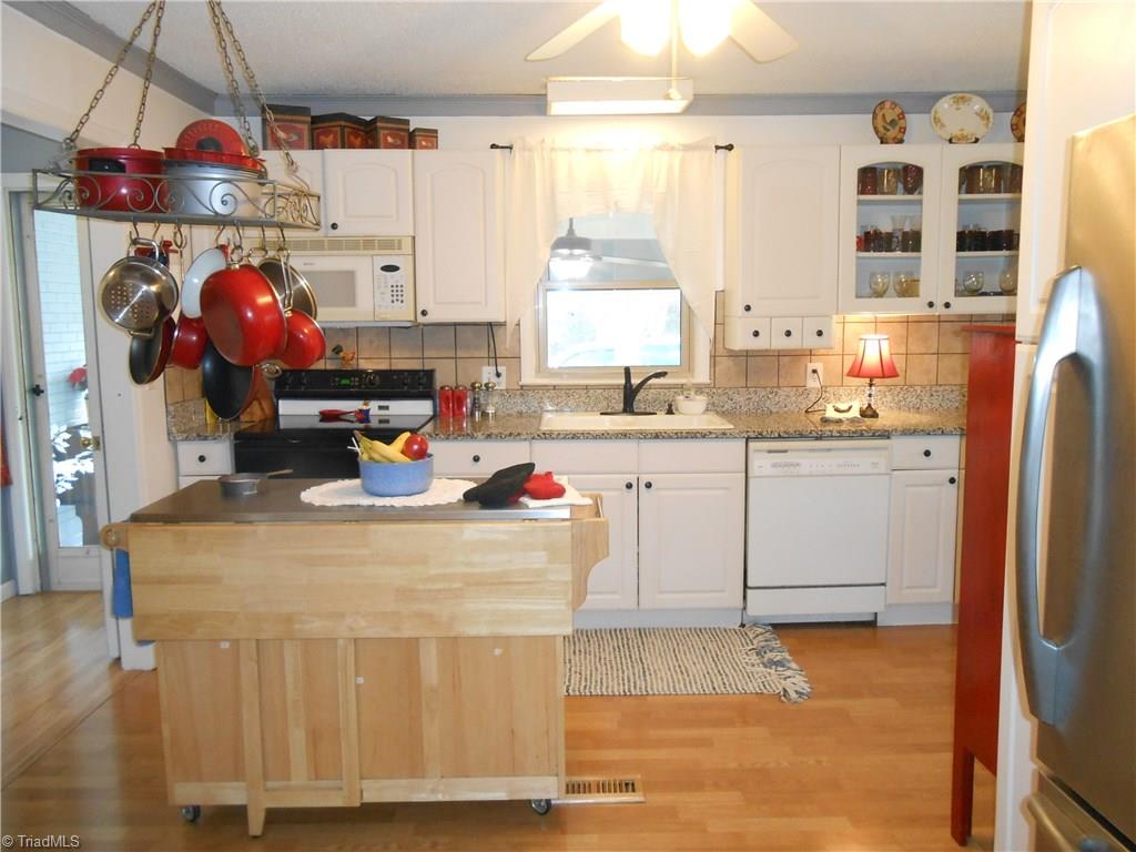 1197 Pleasant Ridge Road Greensboro, NC 27409 - Photo 4 of 30 Gallery Image 4