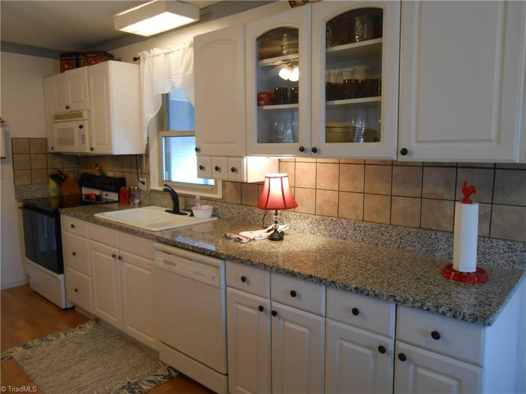 1197 Pleasant Ridge Road Greensboro, NC 27409 - Photo 6 of 30 Gallery Image 6