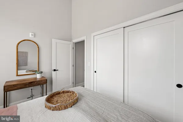 a view of room with a bed