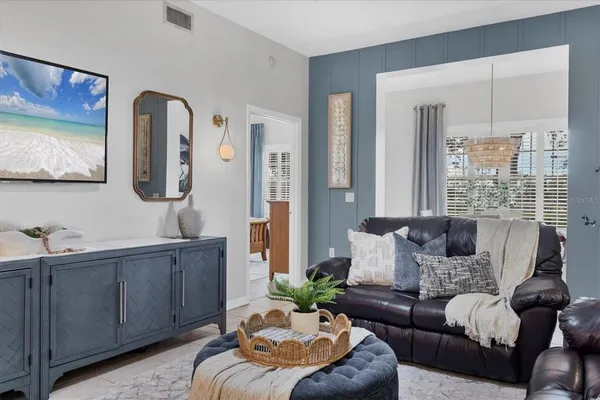 a living room with furniture and window