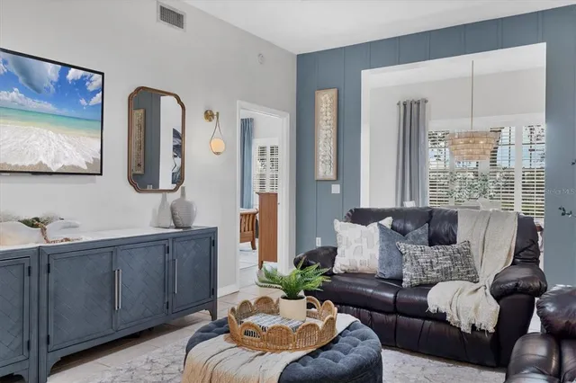 a living room with furniture and window