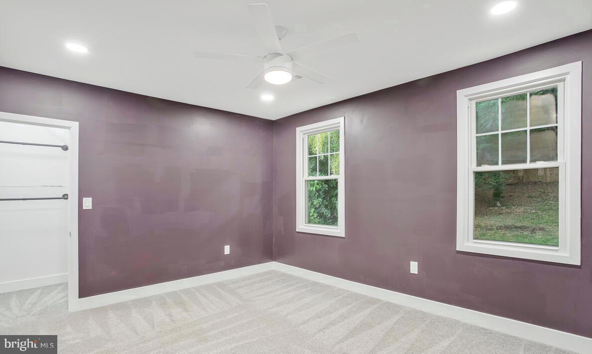 6204 Everall Avenue Baltimore, MD 21206 - Photo 17 of 34 an empty room with windows