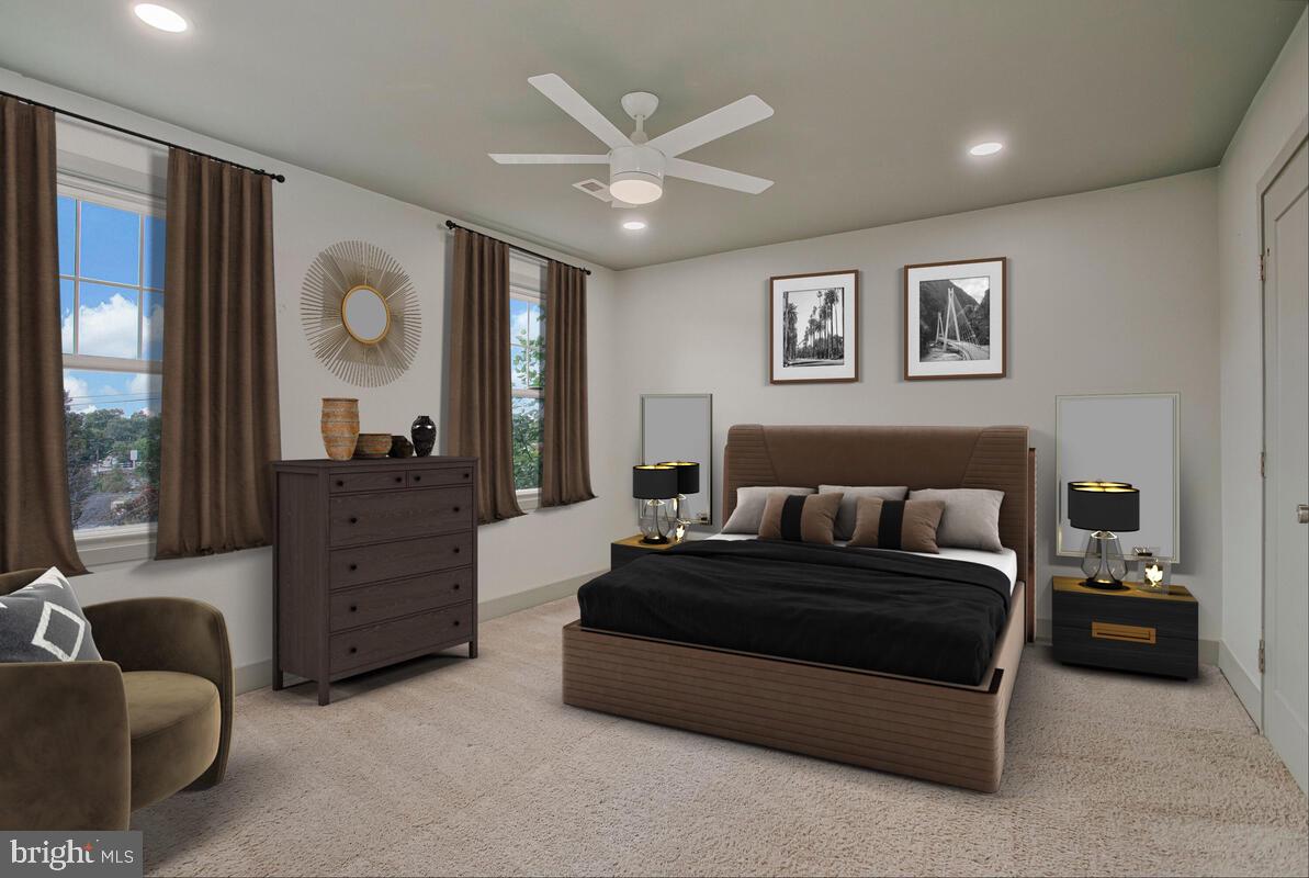 6204 Everall Avenue Baltimore, MD 21206 - Photo 19 of 34 a living room with furniture and a ceiling fan