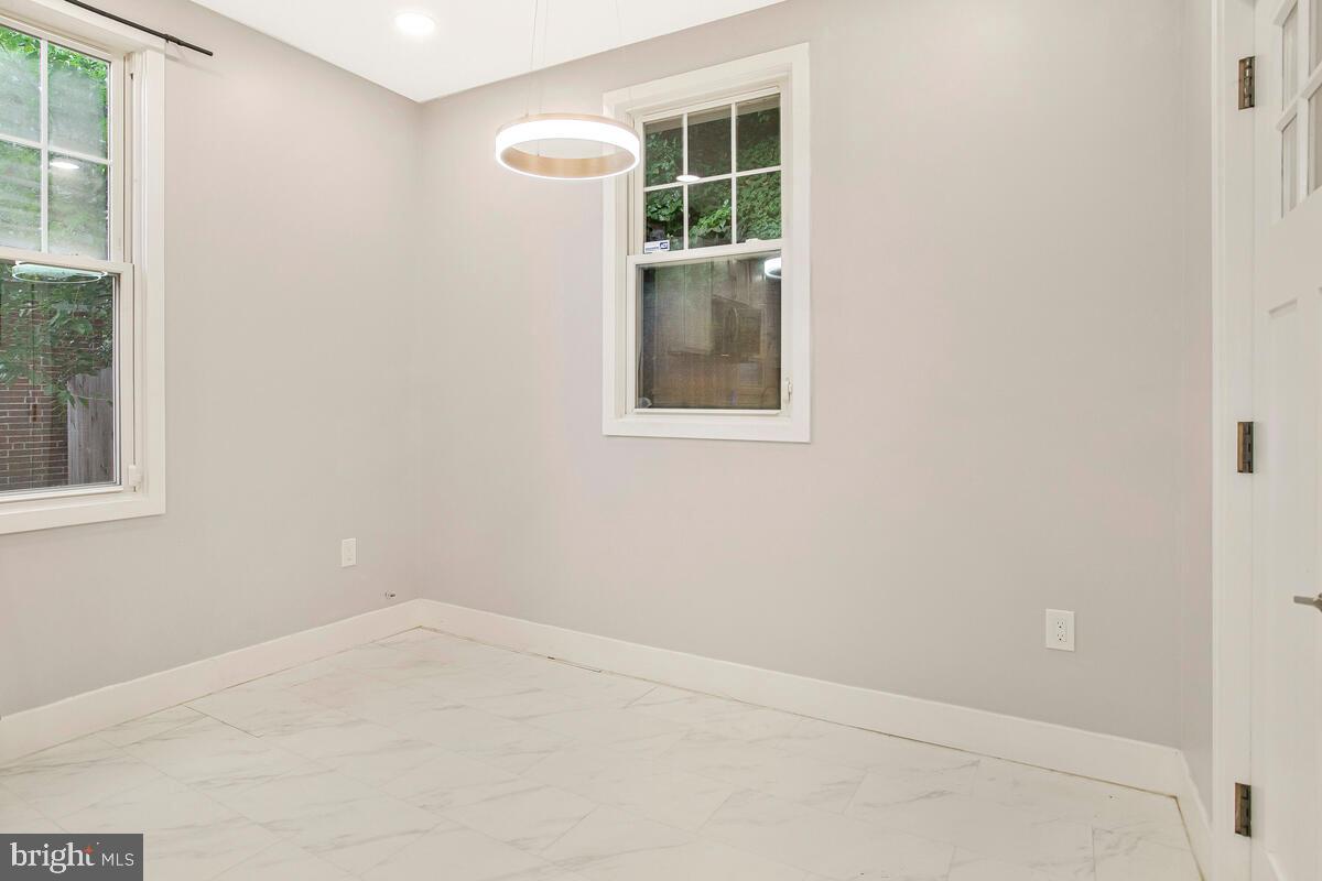 6204 Everall Avenue Baltimore, MD 21206 - Photo 26 of 34 a room that has a window in it