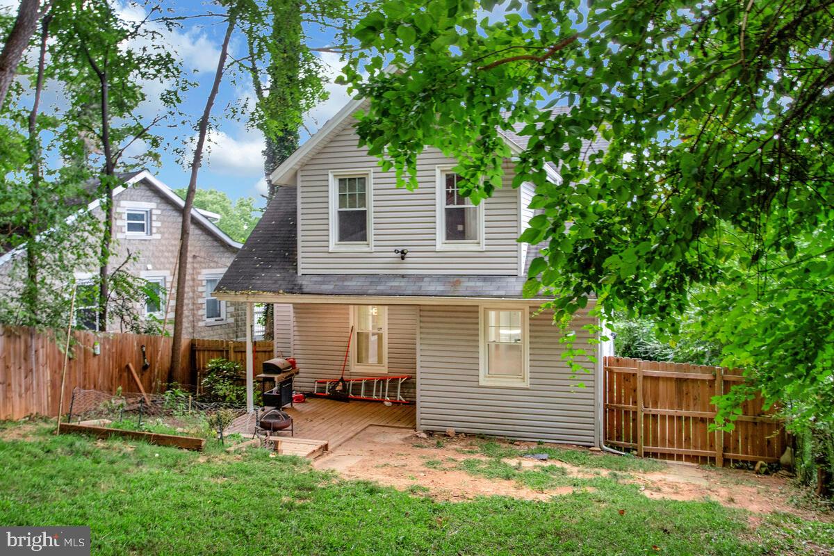 6204 Everall Avenue Baltimore, MD 21206 - Photo 34 of 34 a view of a house with a yard