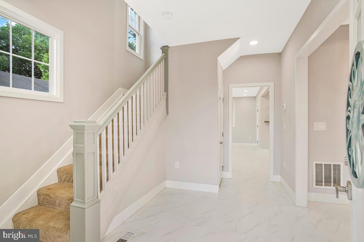 6204 Everall Avenue Baltimore, MD 21206 - Photo 6 of 34 a view of an entryway with staircase