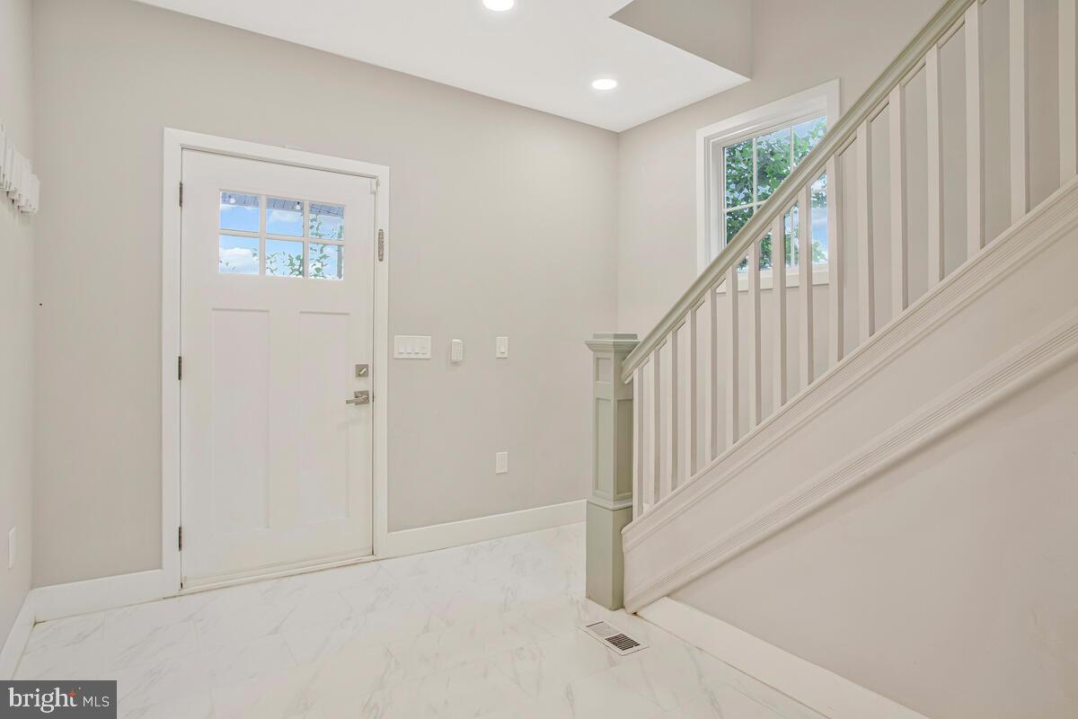 6204 Everall Avenue Baltimore, MD 21206 - Photo 7 of 34 a view of an entryway with staircase