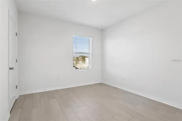 an empty room with a window