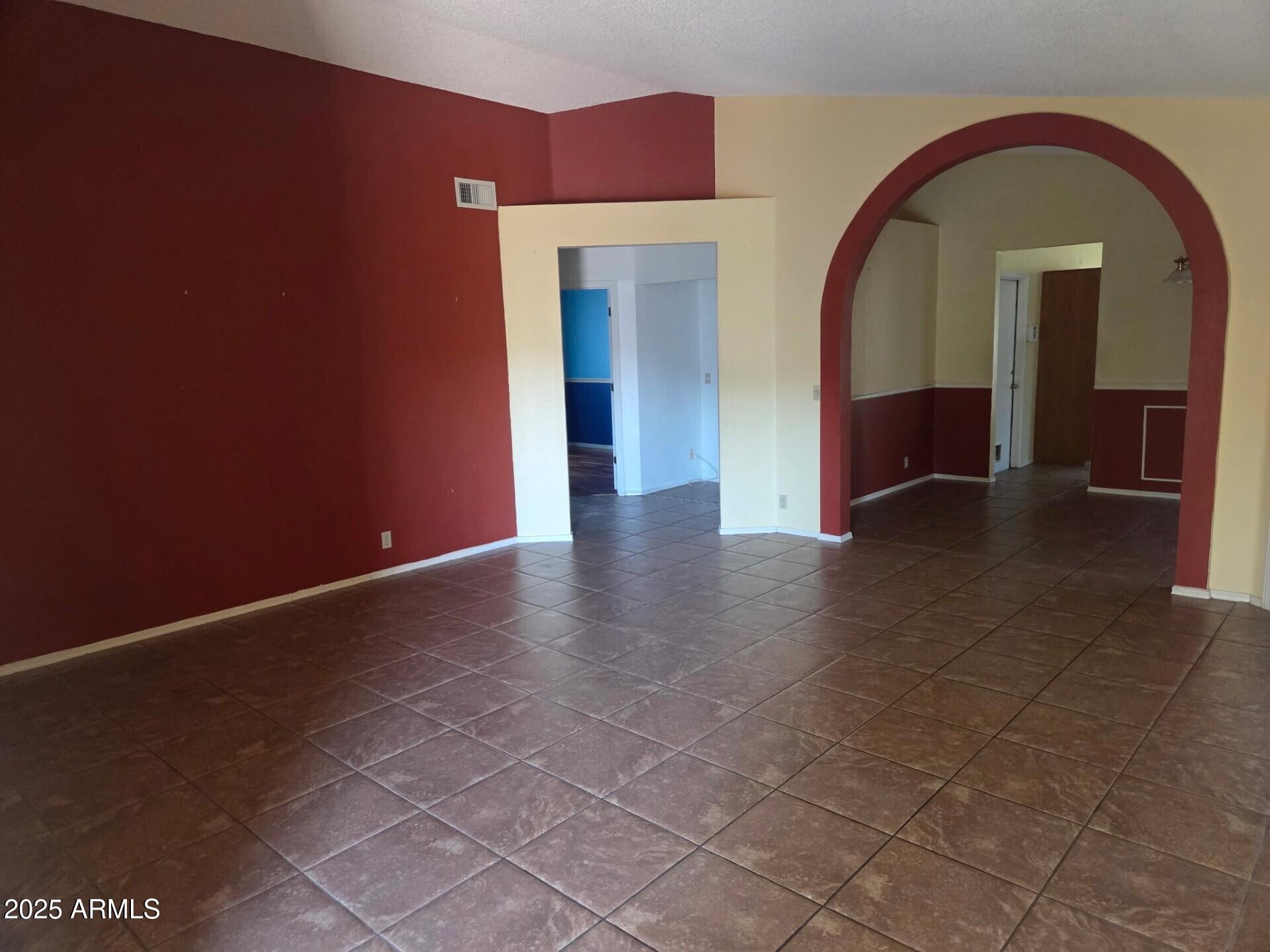 3009 East Utopia Road Phoenix, AZ 85050 - Photo 8 of 13 a view of gallery with wooden floor
