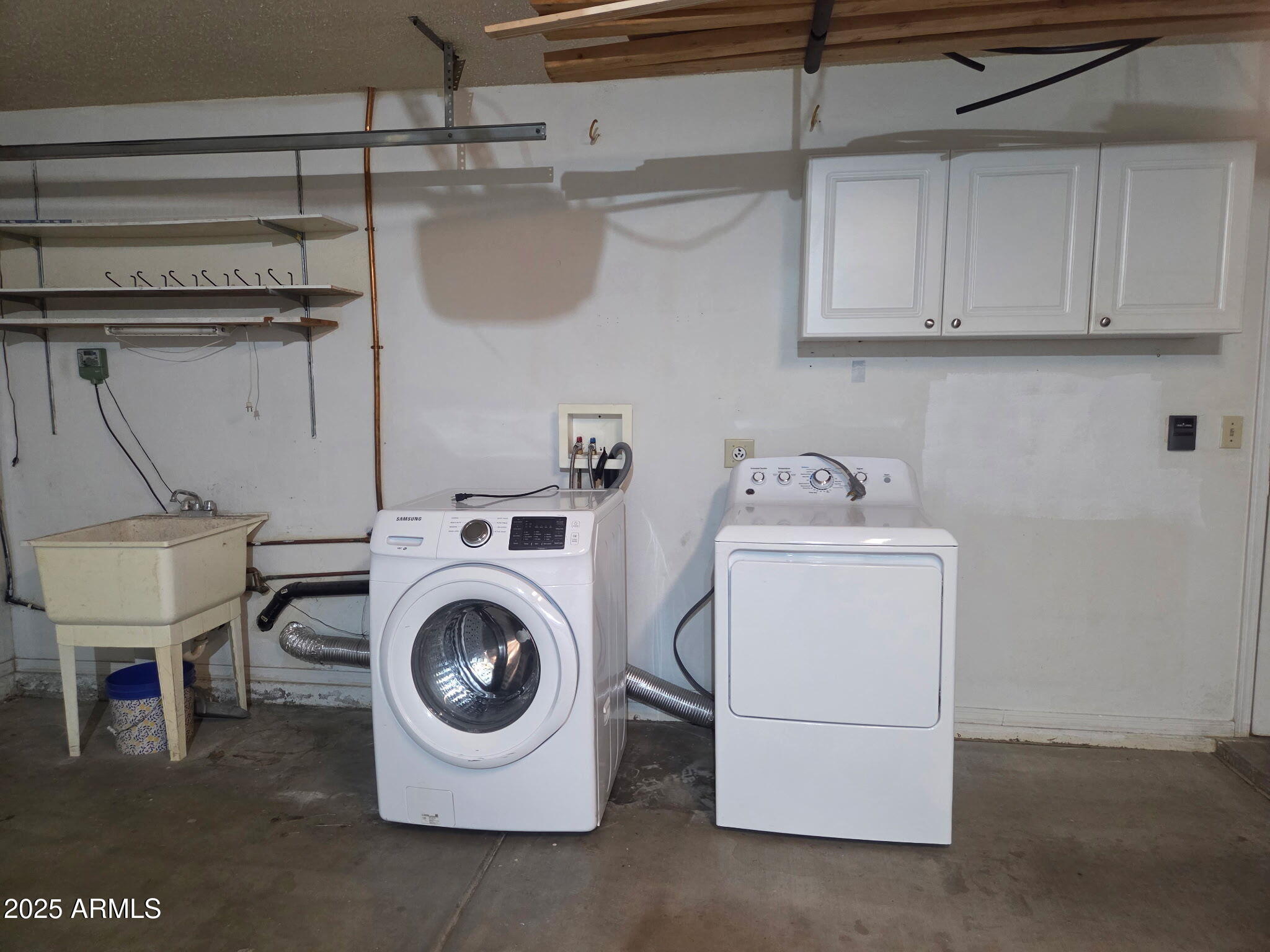 3009 East Utopia Road Phoenix, AZ 85050 - Photo 10 of 13 a utility room with dryer and washer