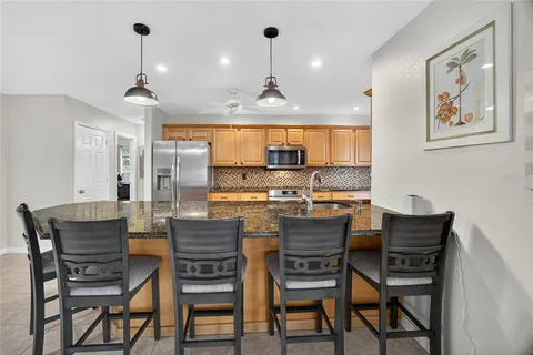 a view of a dining room with furniture