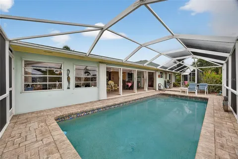 a front view of a house with swimming pool