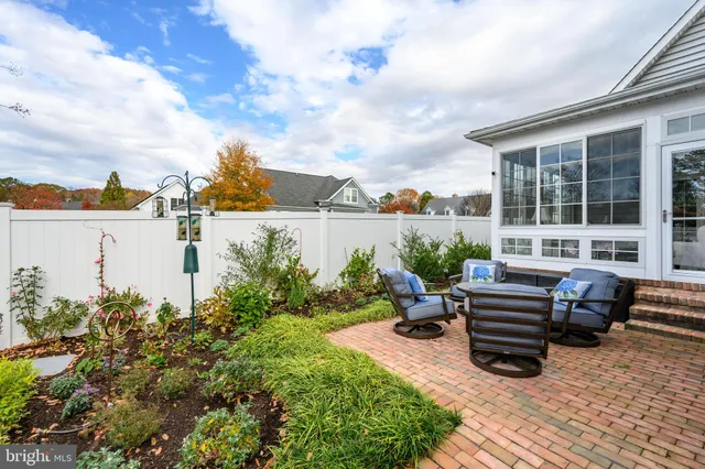a garden view with a seating space