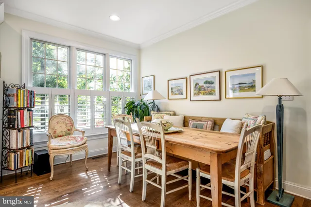 a bathroom with a granite countertop sink mirror and double