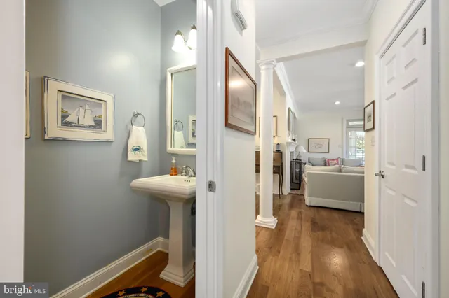 a bed room with a bed and a chandelier