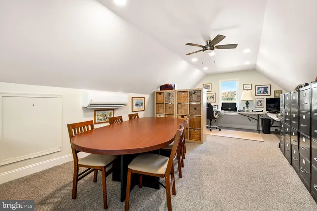 a view of a park with large trees