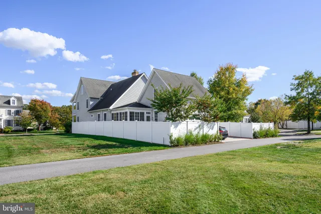 a view of a chairs and table in the patio