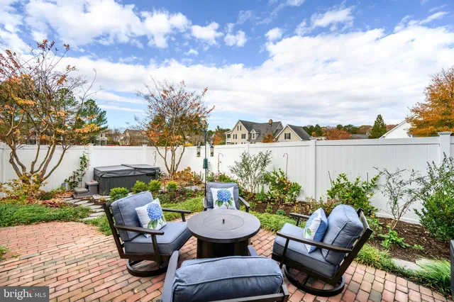 a view of a terrace with sitting area